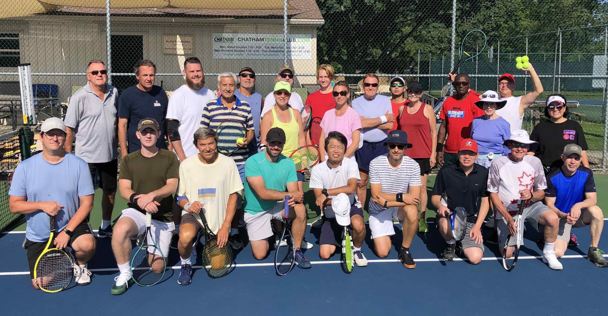 People playing tennis at a modern club